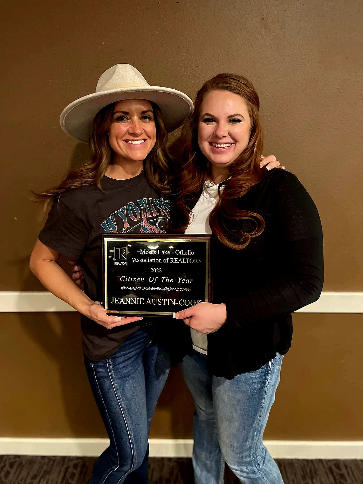 Jeannie Austin-Cook, right, was recognized for her commitment to the Grant County Community at this year’s Moses Lake-Othello Association of Realtors annual banquet on Saturday. Austin-Cook is the founder and one of the admins of a local Facebook group that works to support parents in Grant County. Tammi Canfield, president of the association, who presented the award is pictured on the left.