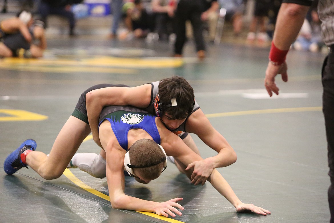 Ephrata junior Jorge Rodriguez, right, finished in third place of the 126 weight class at the Quincy Mat Animal Invitational over the weekend. Rodriguez defeated Warden’s Junior Santiago in the third-place match.