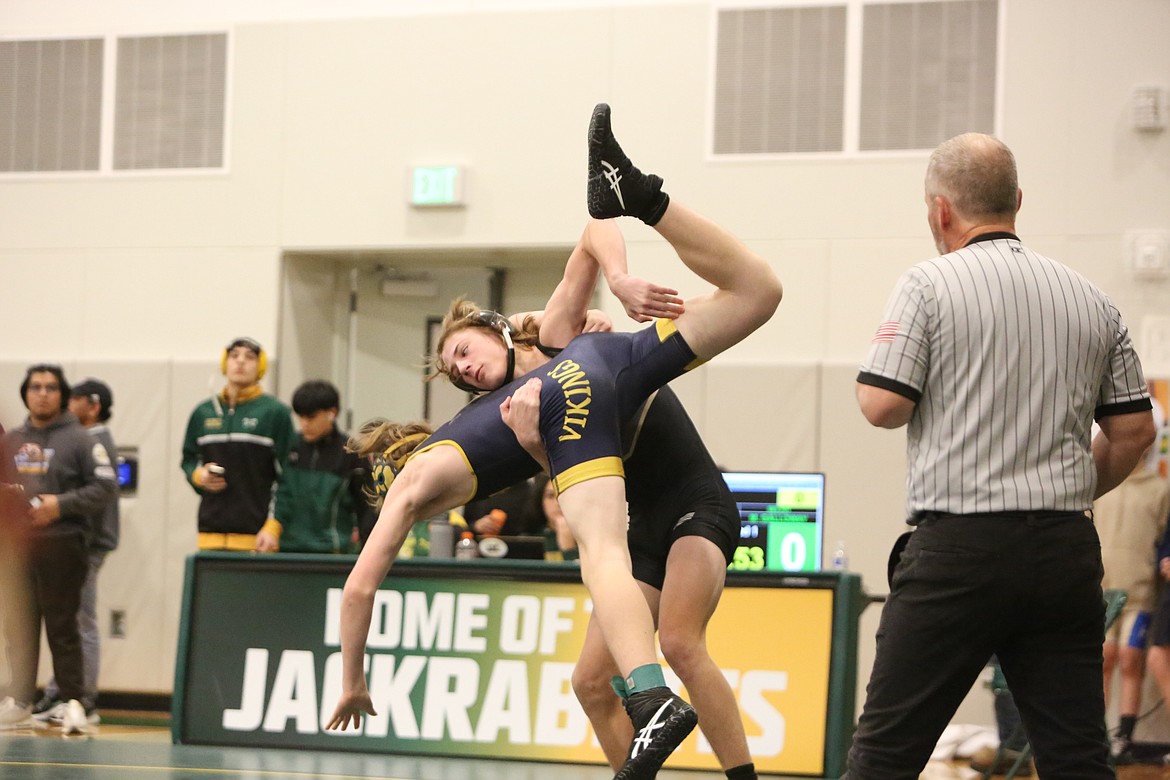 Royal freshman Shea Stevenson, center, takes down a Selah wrestler at the Mat Animal Invitational. Stevenson finished first in the 145 consolation first-place match by a technical fall over Tonasket’s Sedric Mendoza.