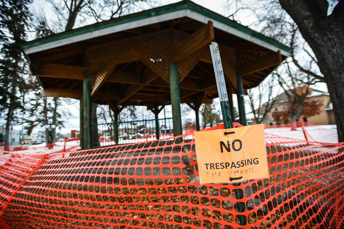 "No Trespassing" signs and orange temporary fencing around the gazebo at Depot Park in Kalispell on Tuesday, Jan. 24. (Casey Kreider/Daily Inter Lake)