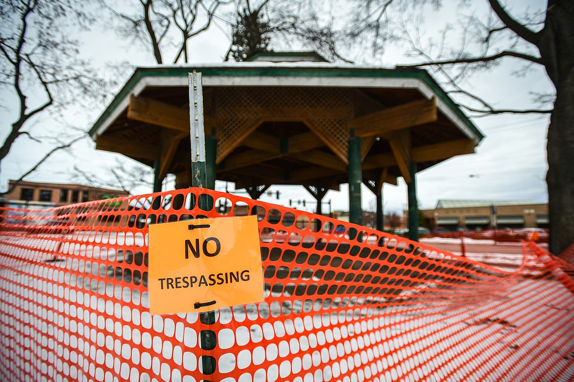 "No Trespassing" signs and orange temporary fencing around the gazebo at Depot Park in Kalispell on Tuesday, Jan. 24. (Casey Kreider/Daily Inter Lake)