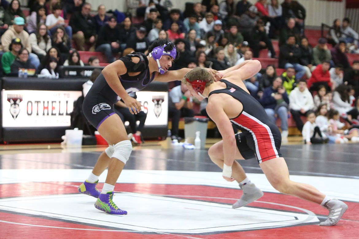 Othello senior Terrill Freeman, right, was one of two Huskie wrestlers to compete in the 195-pound weight class at the Rumble in the Valley tournament over the weekend. Freeman placed fifth.