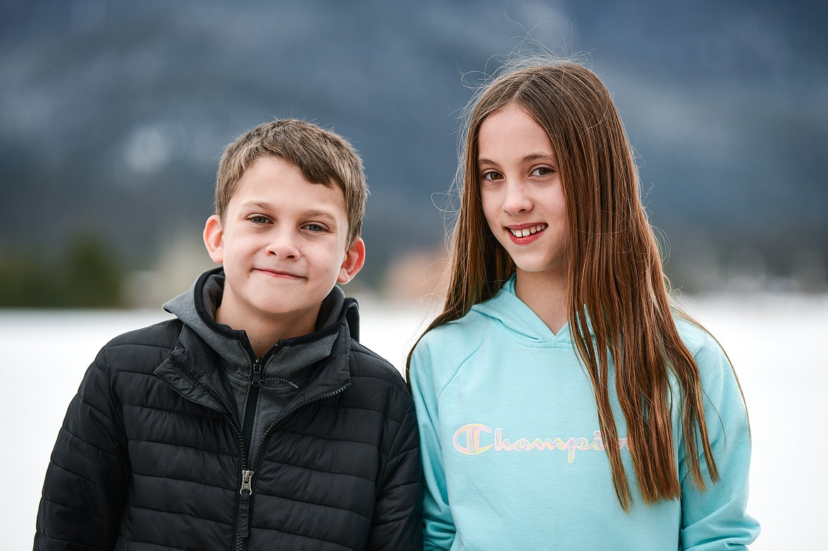 Fifth-grade twins Alex and Stephanie Gurtcheff, one of eight sets of twins enrolled at Cayuse Prairie School on Tuesday, Jan. 24. (Casey Kreider/Daily Inter Lake)