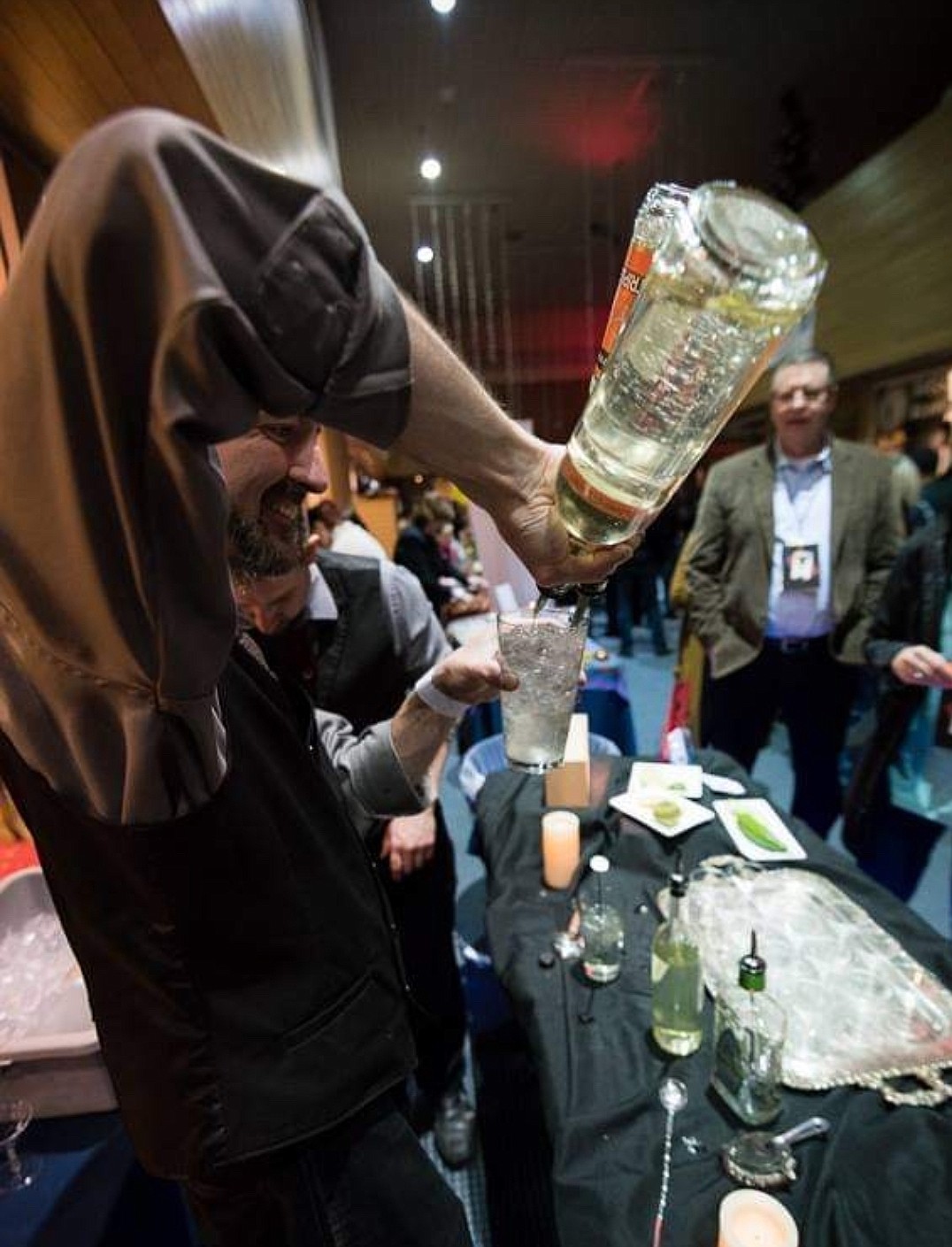 Michael Irby pours a drink at a past Help Every Little Paw (H.E.L.P.) Bartenders' Ball. This year's ball will start at 5 p.m. March 11 at the Coeur d'Alene Casino.