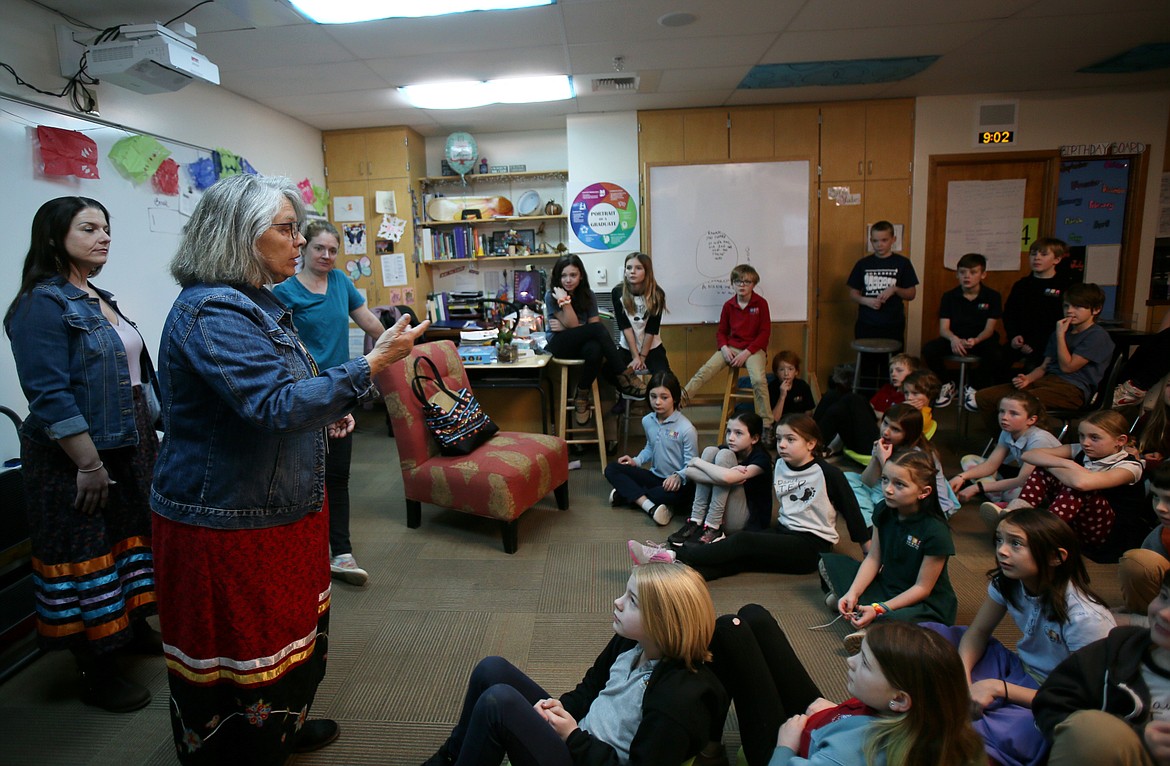 Coeur d'Alene School District Indigenous Education program coordinator Sarai Mays on Wednesday morning tells Sorensen School of the Arts and Humanities fourth graders a Blackfoot story of greed and forgiveness. Mays is retiring Tuesday after 10 years with the district.