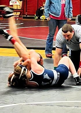 Neveah Therrien pinning an opponent earlier in the season.