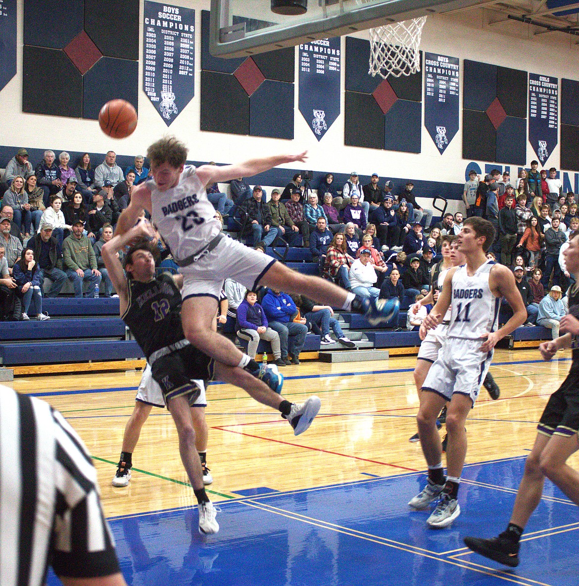 Porter Schulte attempts block against Kellogg.