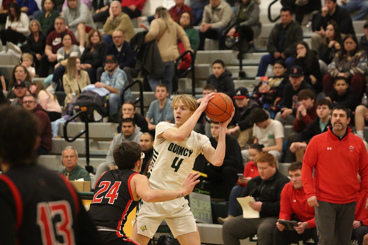 Quincy junior Aidan Bews finished with 21 points against the Omak Pioneers, scoring 11 points in the first half.