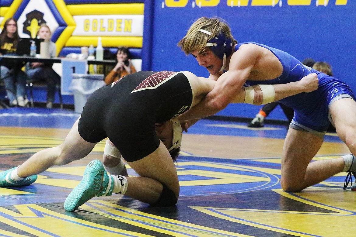 Chris Rathjen, top, had a great tourney at Lewistown, beating three-time state champion Owen Lonski of Sidney. (Bob Windauer photo)