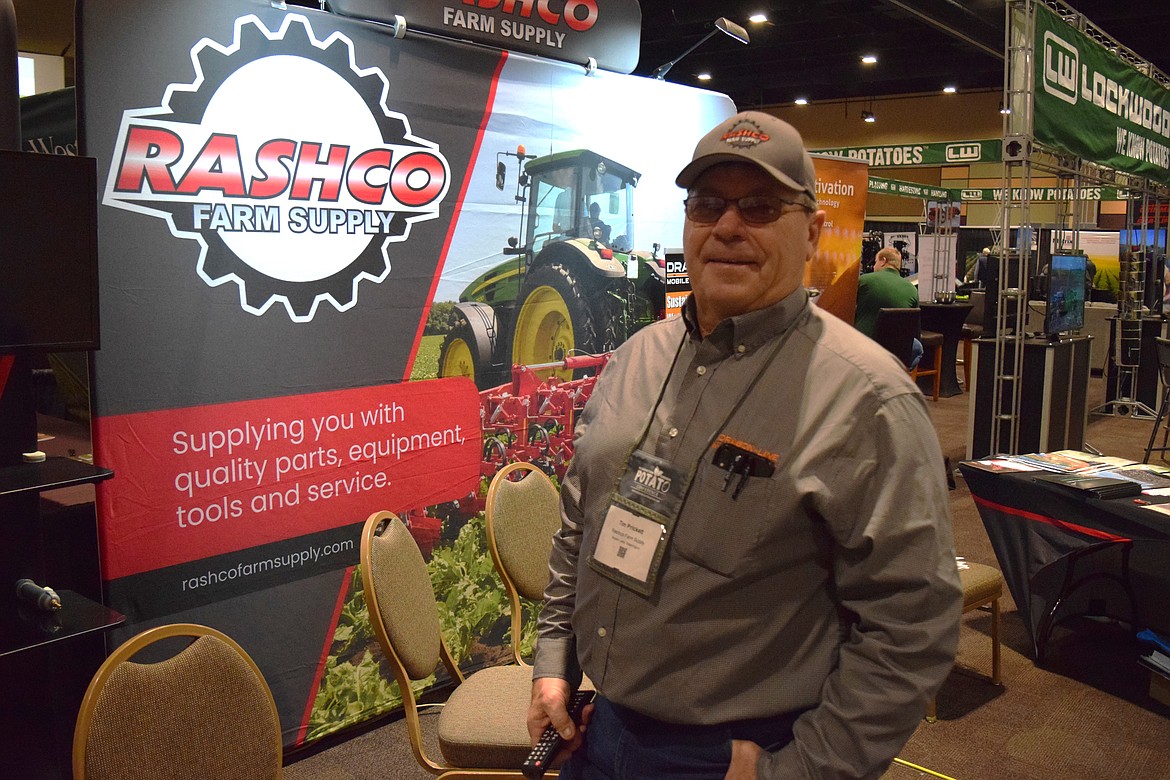 Tim Prickett, owner of Rashco Farm Supply in Moses Lake, in his display booth at the Washington-Oregon Potato Conference in Kennewick on Thursday. “It’s the only conference we do all year,” Prickett said.