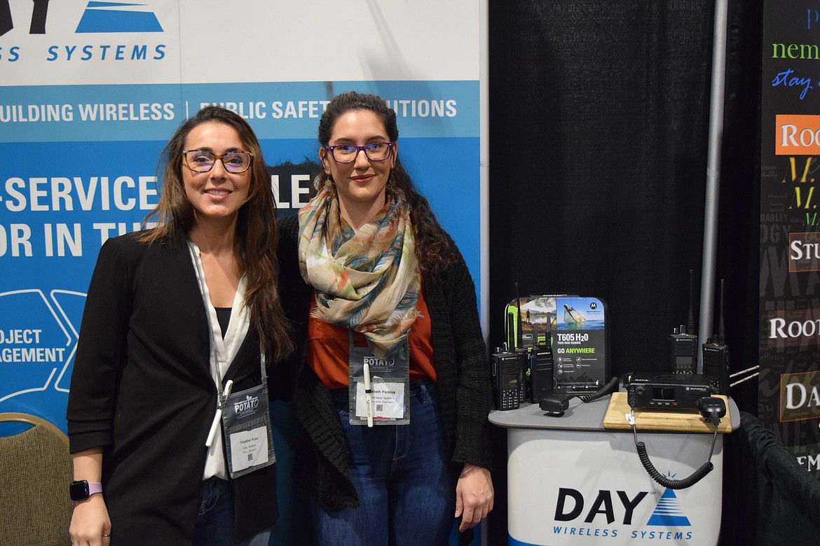 Heather Rose and Elizabeth Perkins of Day Wireless Systems at this year’s Washington-Oregon Potato Conference. The company sell-two radios and data communications equipment to farmers across the region.