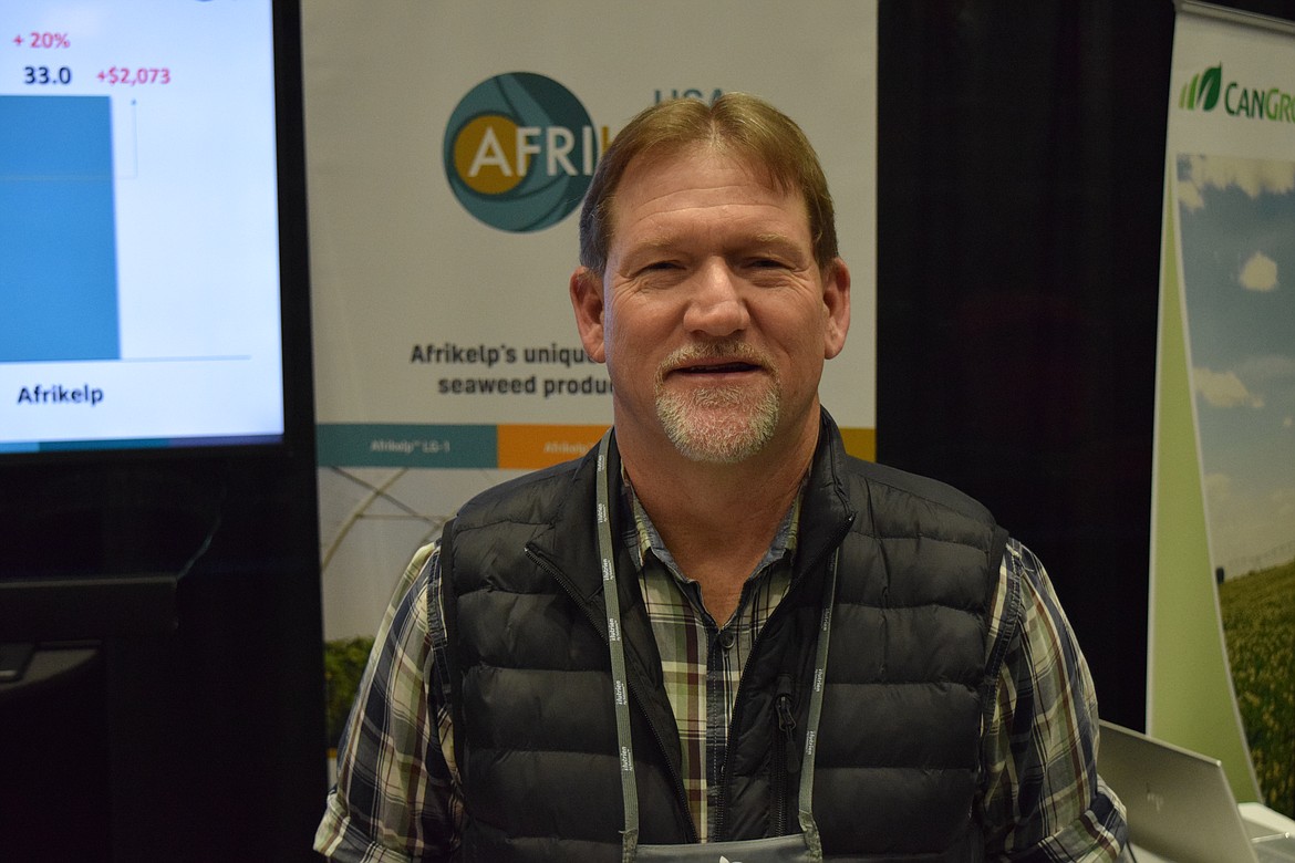 Agronomist Ted Koellmann with Afrikelp, which sells fertilizer derived from kelp grown off the coast of South Africa, at this year’s Washington-Oregon Potato Conference. It was the first time for the company to show off its product at the conference, Koellmann said.