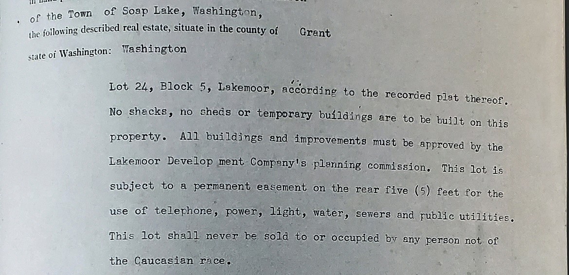This 1947 deed for a property in Soap Lake specifies that the buyer may not sell the property to any member of a racial minority. The Supreme Court would make such covenants unenforceable that same year, but the documents remain part of the official record.  (Note: The original image contained white text on a black background. It has been modified for legibility.)