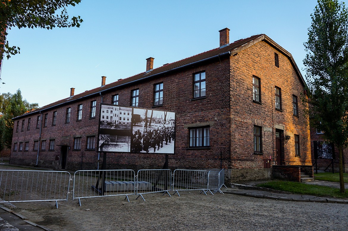 A billboard at Auschwitz-Birkenau shows photos of prisoners being intaken at the concentration camp where about 1 million Jews and other victims were killed during World War II under Adolph Hitler's Nazi regime.