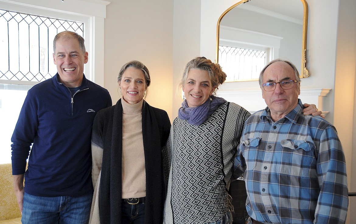 Andrew and Denise Strong, owners of the home at 405 Central Avenue, in the sitting room along with Allison Thomas and Leo Keane, of North Country Builders which was the contractor that completed refurbishing the home. (Heidi Desch/Daily Inter Lake)