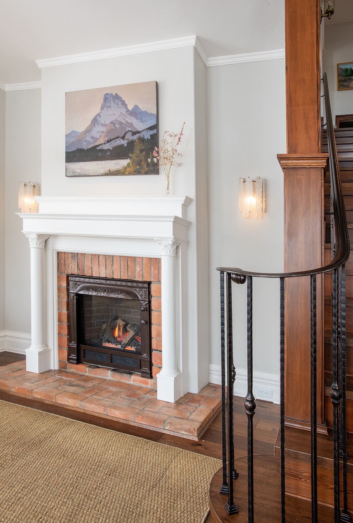 The metal and bricks from the original fireplace in the home were saved to be reused in the new fireplace in the sitting room of the Houston Home on Central Avenue in Whitefish. (Photo courtesy of Jessica Vizzutti of Cou Cou Studio)