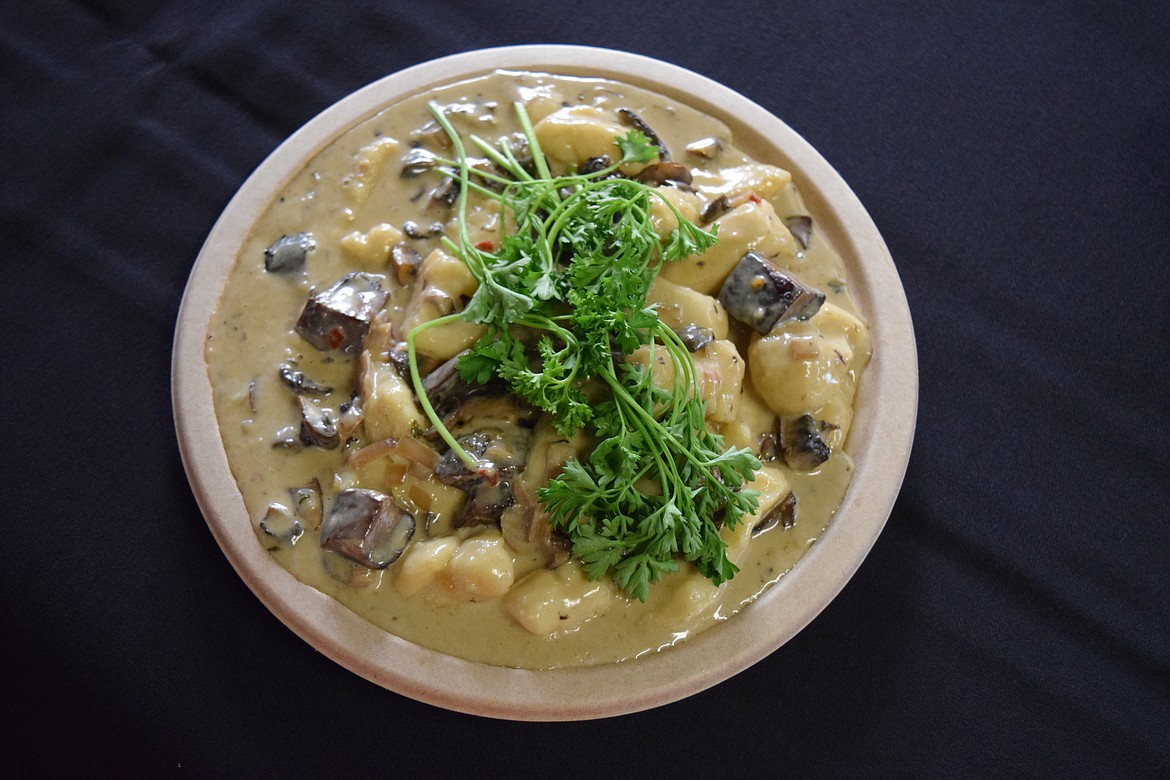 The final product, Washington potato gnocchi with wild mushrooms garnished (badly) with parsley.
