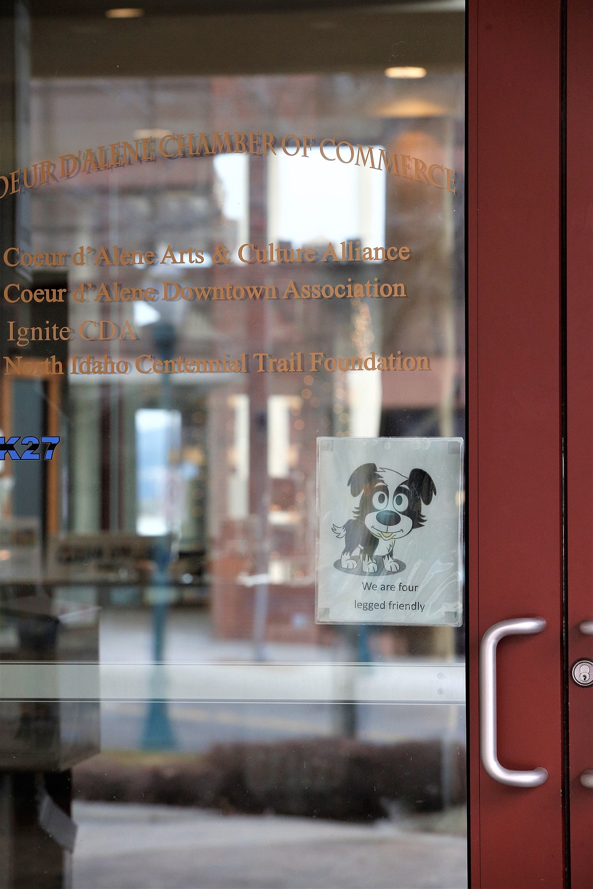 A sign on the door of the Coeur d'Alene Regional Chamber makes it clear dogs are welcome.