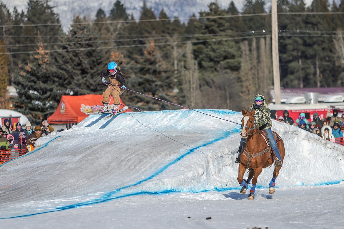A skier catches air off a jump at the Whitefish Skijoring competition on Saturday, Jan. 28 in Columbia Falls. The action continues Sunday from noon to 4 p.m., with an awards ceremony following at the Blue Moon. (JP Edge/Hungry Horse News)