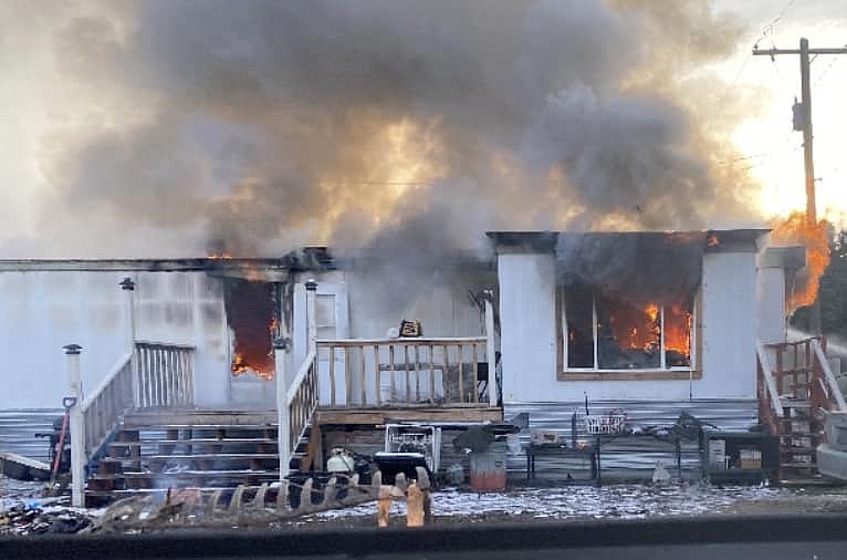 An Othello man was arrested in connection with the fire that destroyed this Othello-area home.