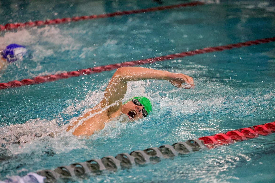 Hayden Knauer competes in the 50 freestyle event at the Wave on Friday. (JP Edge/Hungry Horse News)