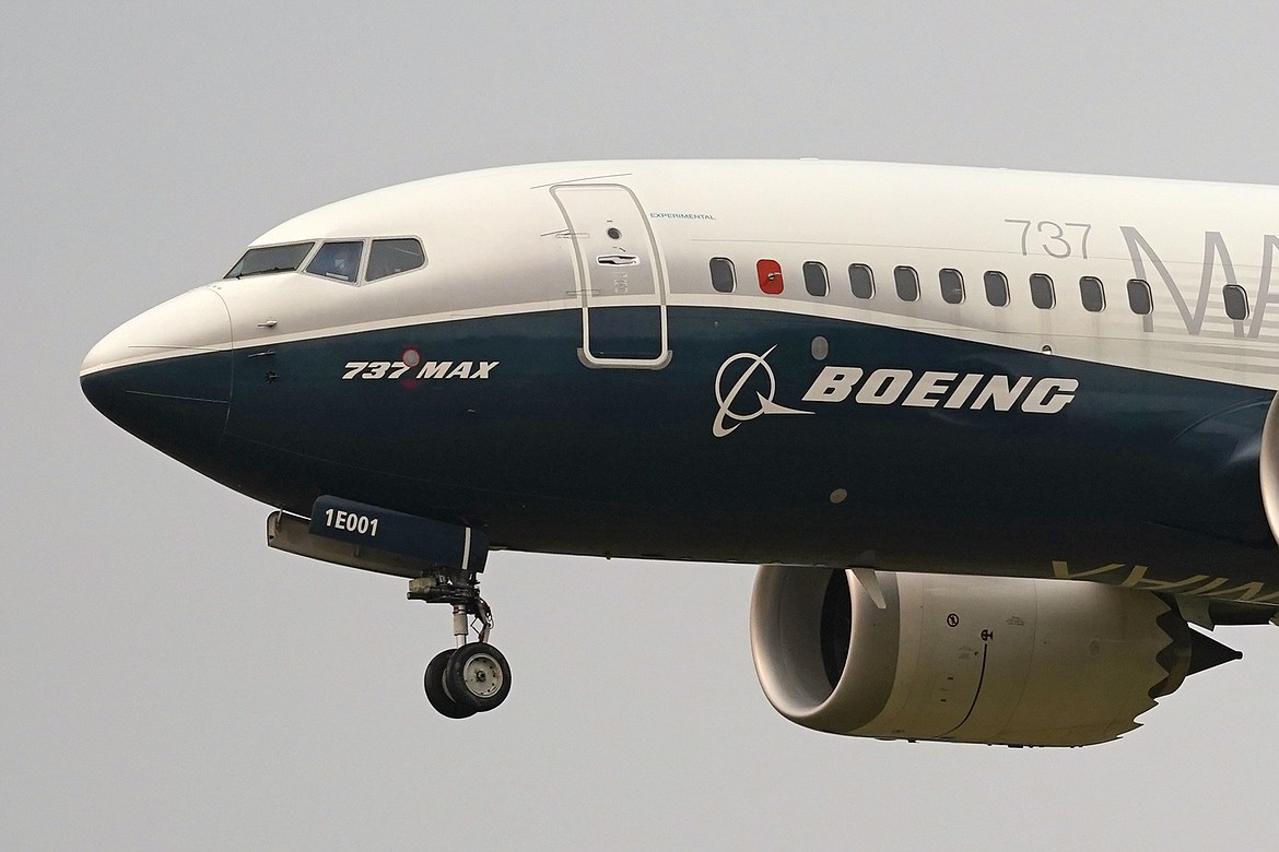 A Boeing 737 Max jet prepares to land at Boeing Field following a test flight in Seattle, Sept. 30, 2020. According to a note Monday, Jan. 30, 2023, to employees from Stan Deal, the CEO of Boeing's commercial-planes business, Boeing will add a fourth assembly line to produce more 737 Max aircraft, as it tries to more quickly translate a backlog of orders into cash-generating deliveries of new planes. The new line will open in the second half of next year. (AP Photo/Elaine Thompson, File)