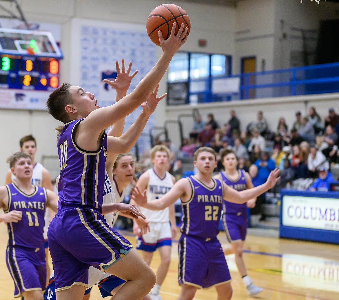 Polson's Tyler Wenderoth heads for a layup during last Saturday's game in Columbia Falls. (Chris Peterson/Hungry Horse News)