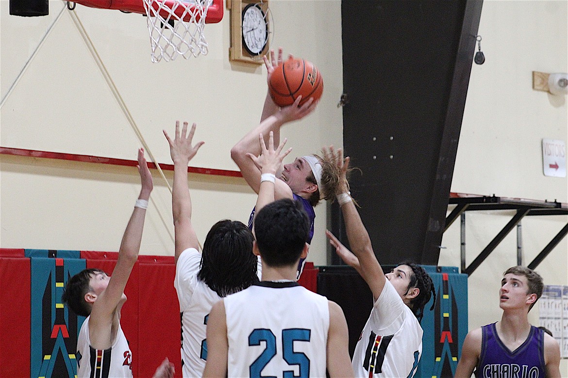 Charlo's Keaton Piedalue goes up for a shot during last week's contest against Two Eagle River. (Ginger Zempel photo)
