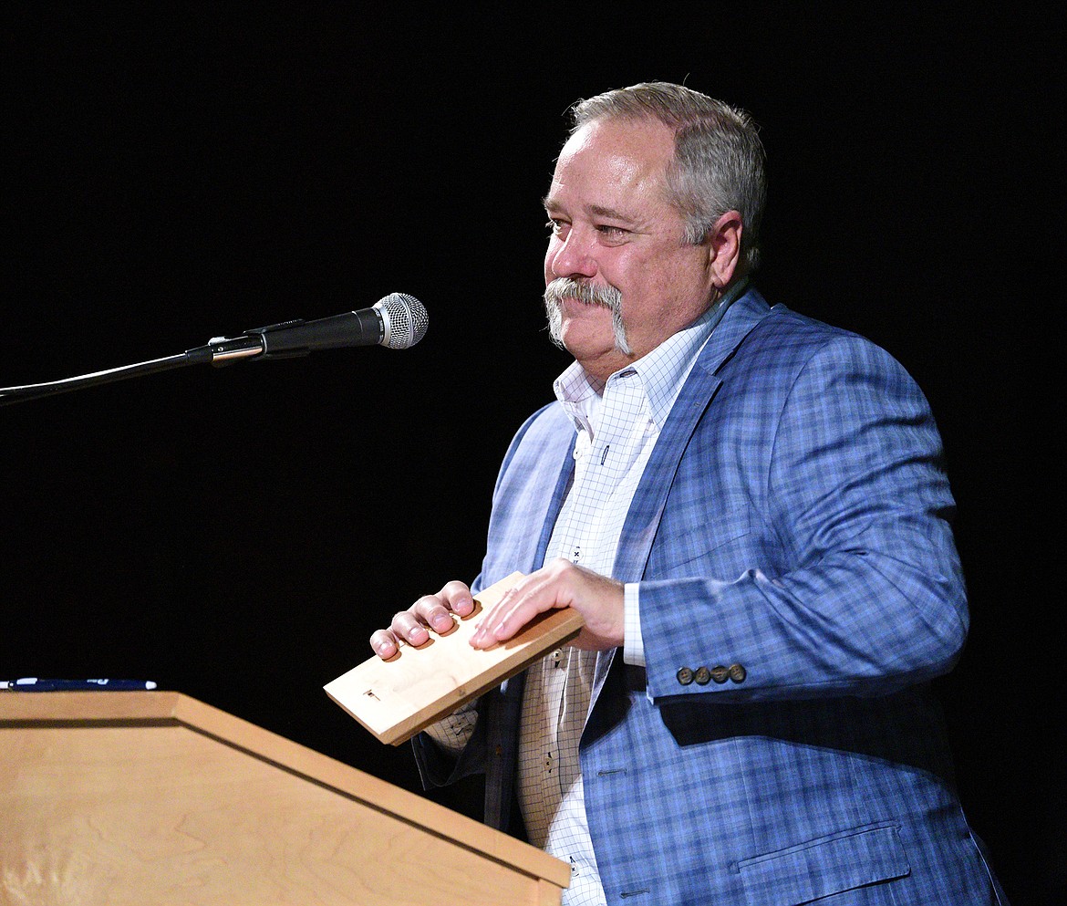 Vance Watson gives a speech after being presented the Volunteer of the Year Award at the Whitefish Chamber Awards Gala Thursday. (Whitney England/Whitefish Pilot)
