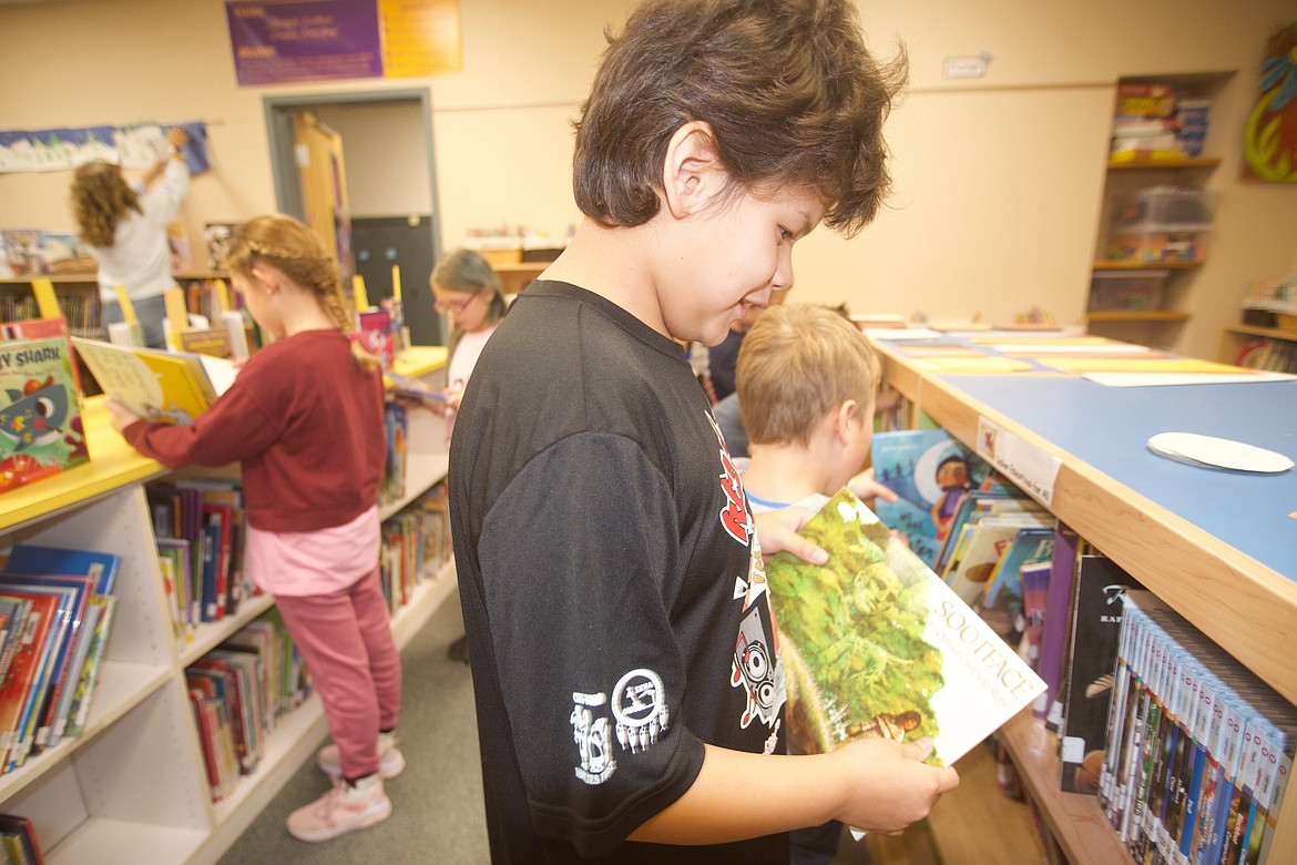 The cramped classroom at Linderman School that currently houses the library holds only a fraction of the school's book collection. (Kristi Niemeyer/Leader)