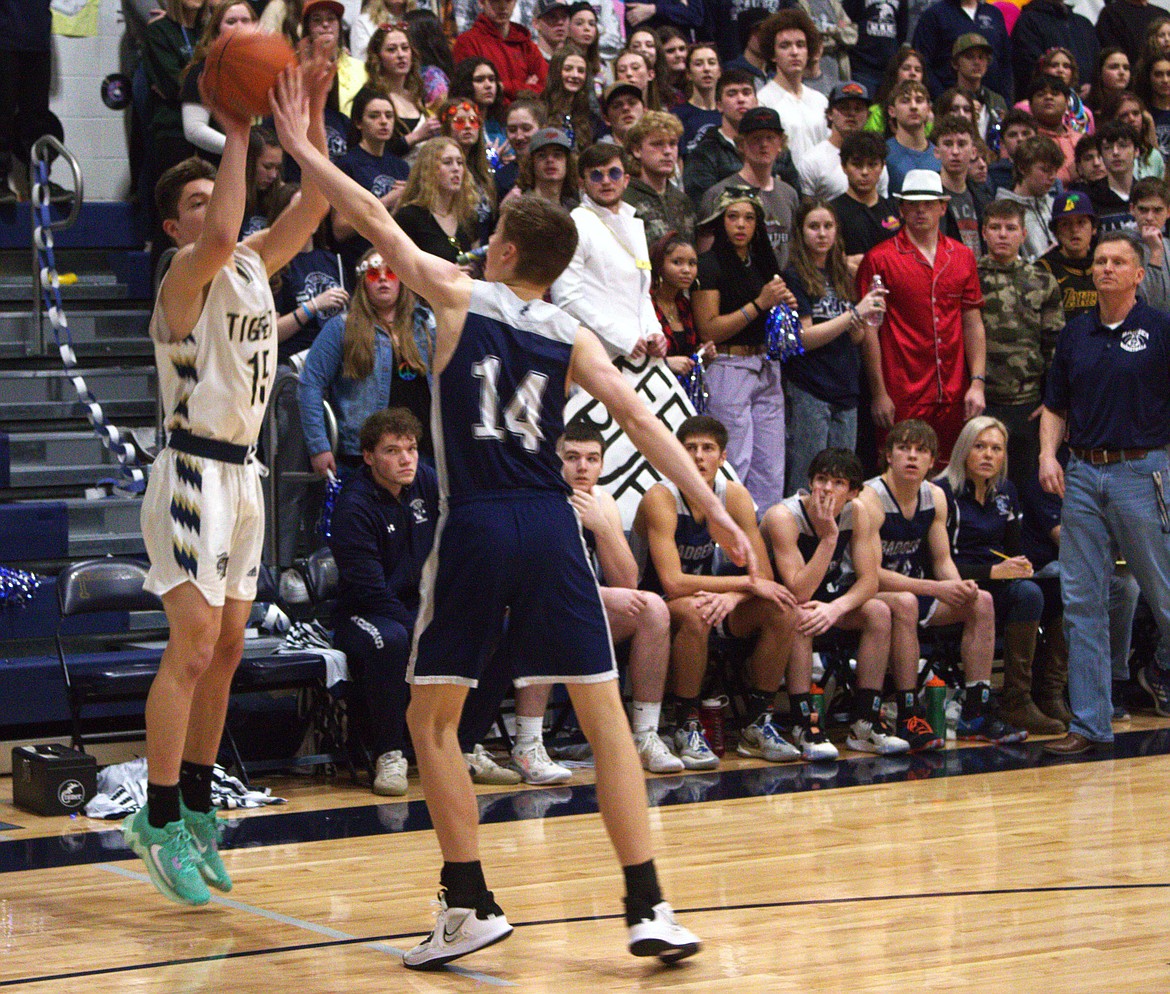 Thomas Bateman goes to block a shot.