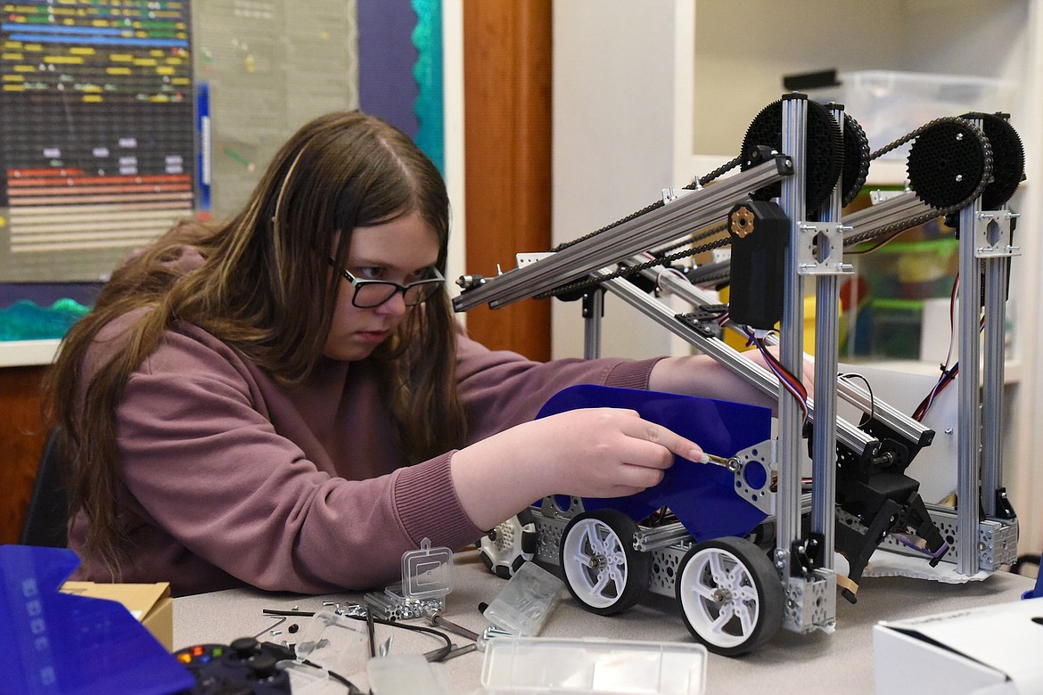 Libby High School robotics team member Ashley Cockerham works on a robot Monday at the school. (Scott Shindledecker/The Western News)