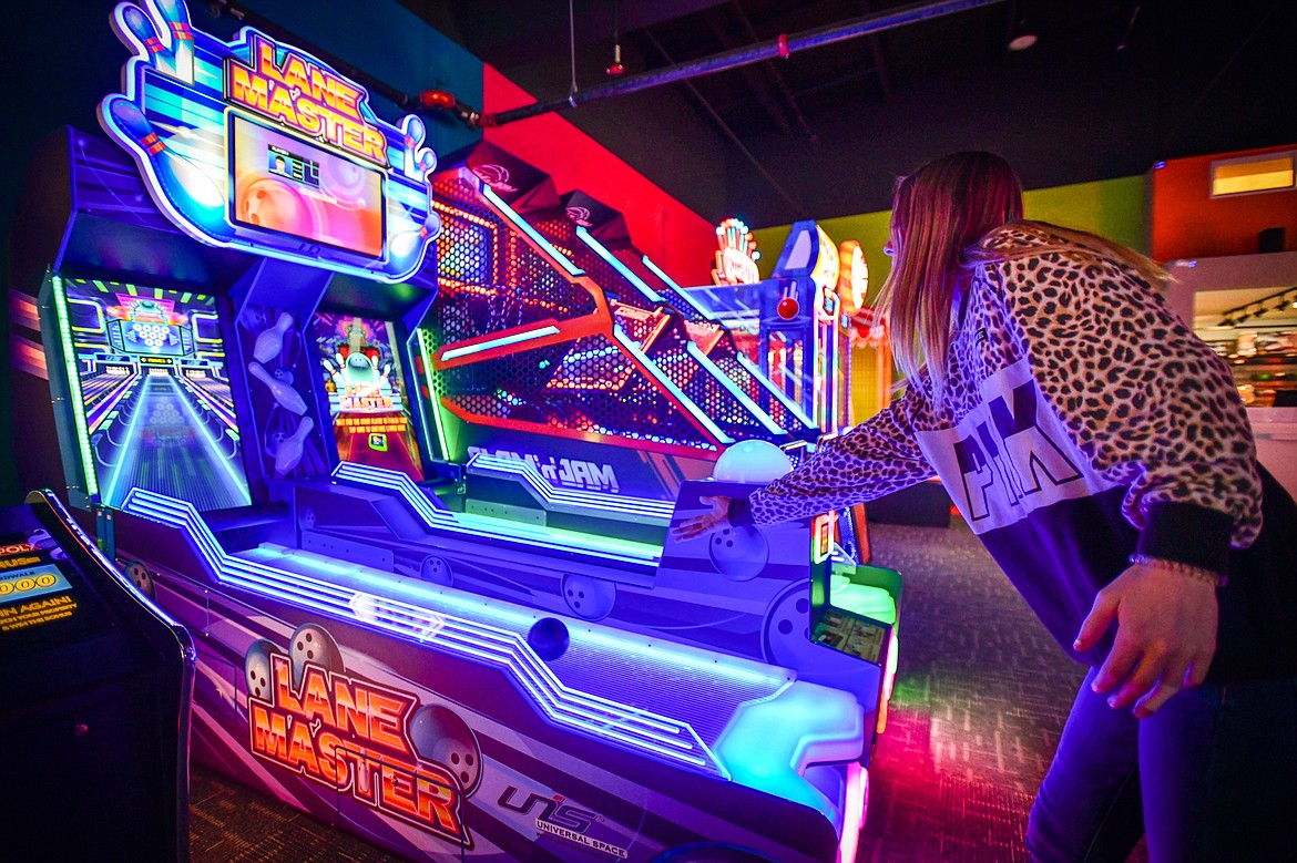 Hailey Speed plays an arcade bowling game called Lane Master at Games N Taps in Kalispell on Tuesday, Jan. 31. (Casey Kreider/Daily Inter Lake)