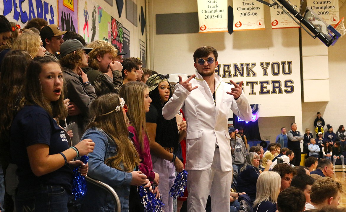 Tully Reinhardt sticks to the "Music through the Decades" theme in his all white Bee Gees outfit at the Backwoods Brawl.