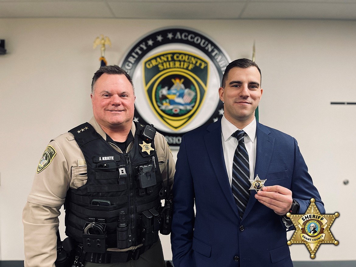 Grant County Sheriff Joe Kriete, left, administered the oath of office to Deputy Sheriff David Borden on Jan. 30. Borden worked with the Adams County Sheriff's Office for four years prior to changing agencies. Police recruitment has become a challenge for offices throughout the country with many officers switching agencies as opportunities to move forward in their careers present themselves.