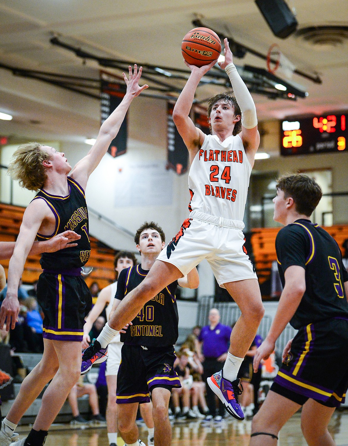 Flathead's Lyric Ersland (24) pulls up for a shot in the lane in the third quarter against Missoula Sentinel at Flathead High School on Friday, Feb. 3. (Casey Kreider/Daily Inter Lake)