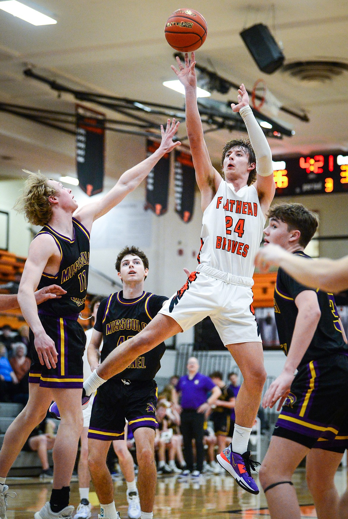 Flathead's Lyric Ersland (24) pulls up for a shot in the lane in the third quarter against Missoula Sentinel at Flathead High School on Friday, Feb. 3. (Casey Kreider/Daily Inter Lake)