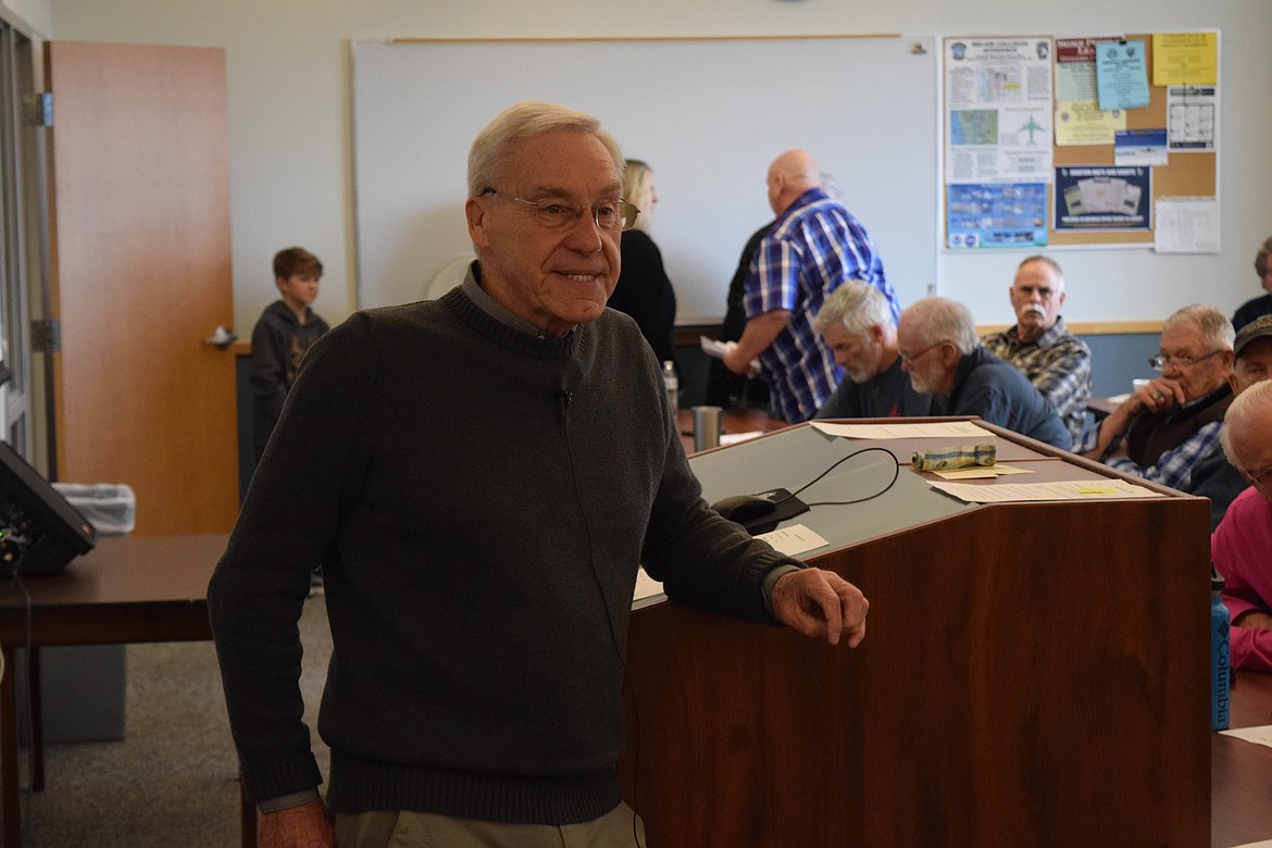 Big Bend Community College flight Instructor giving students a refresher on Saturday on calculating the weight of cargo, pilots and passengers in an aircraft.