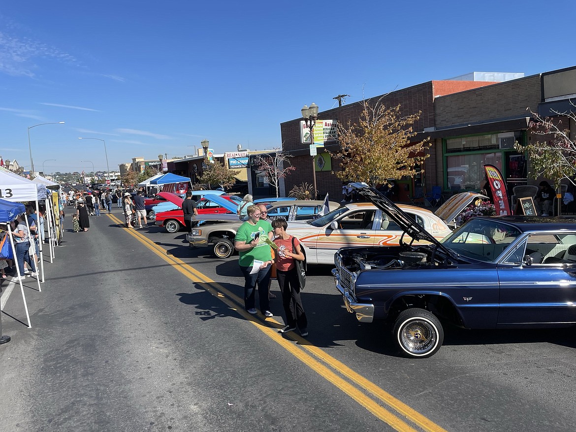 Lowriders and tents lined Third Avenue at the Umani Festival, a celebration of Hispanic culture, in downtown Moses Lake in September 2022. Funds raised through the festival are going toward a new scholarship at Big Bend Community College.