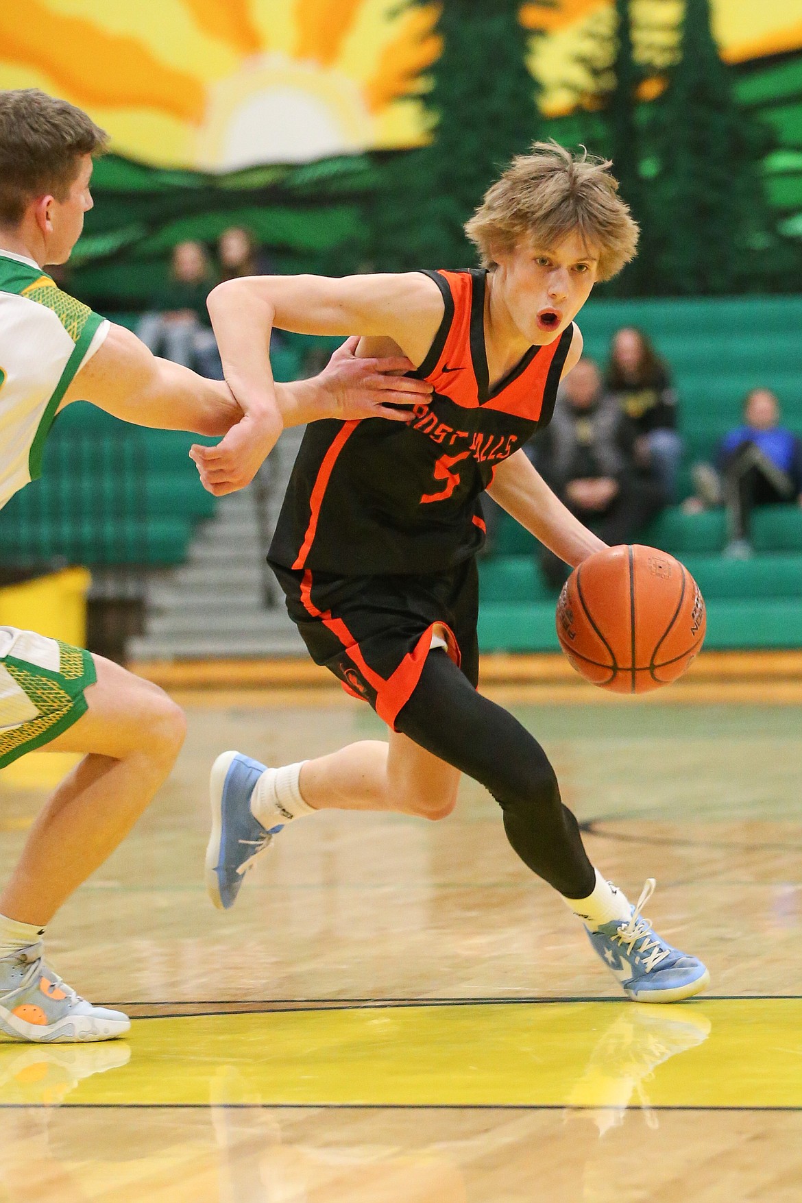 JASON DUCHOW PHOTOGRAPHY
Neil McCarthy of Post Falls drives to the basket against Lakeland on Saturday night at Hawk Court.