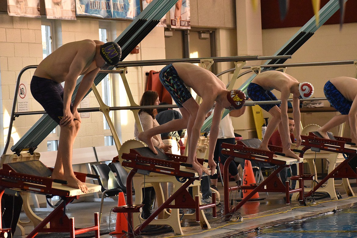 Moses Lake’s Ashton McKean gets ready to swim during the swim and dive district preliminaries on Thursday.