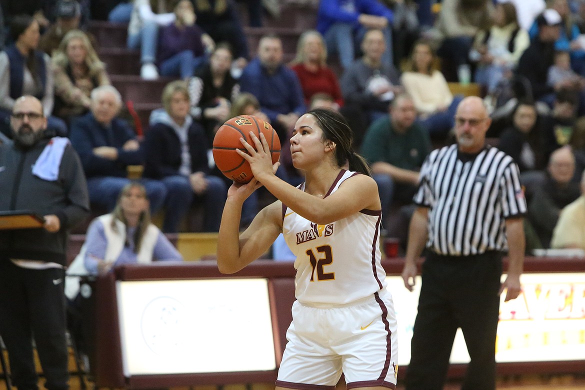 Moses Lake senior Marissa Bischoff (12) attempts a free throw during the first half of the Maverick’s 52-50 win over West Valley (Yakima) on Friday. Bischoff later hit three free throws to give Moses Lake the lead with under a minute remaining.