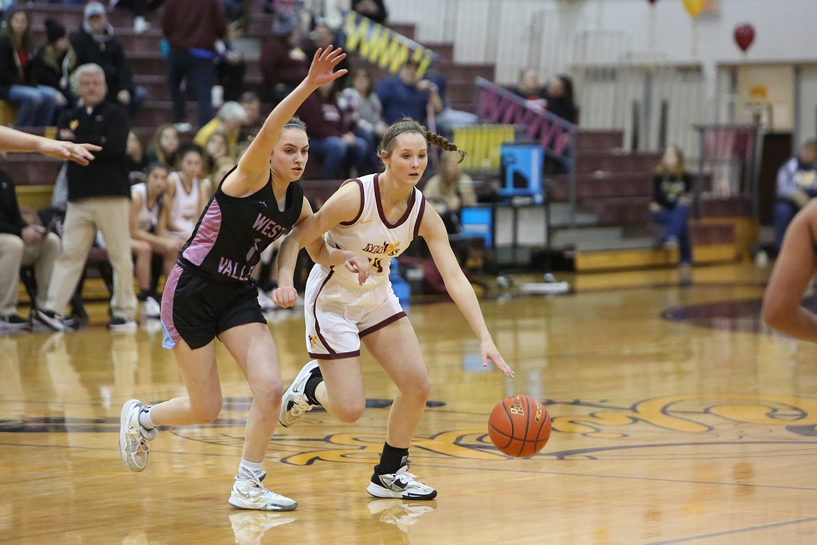 After scoring six points in the first half, Moses Lake junior Lexi Cox (14) scored nine points in the second half to help push the Mavericks to a 52-50 win over West Valley (Yakima).