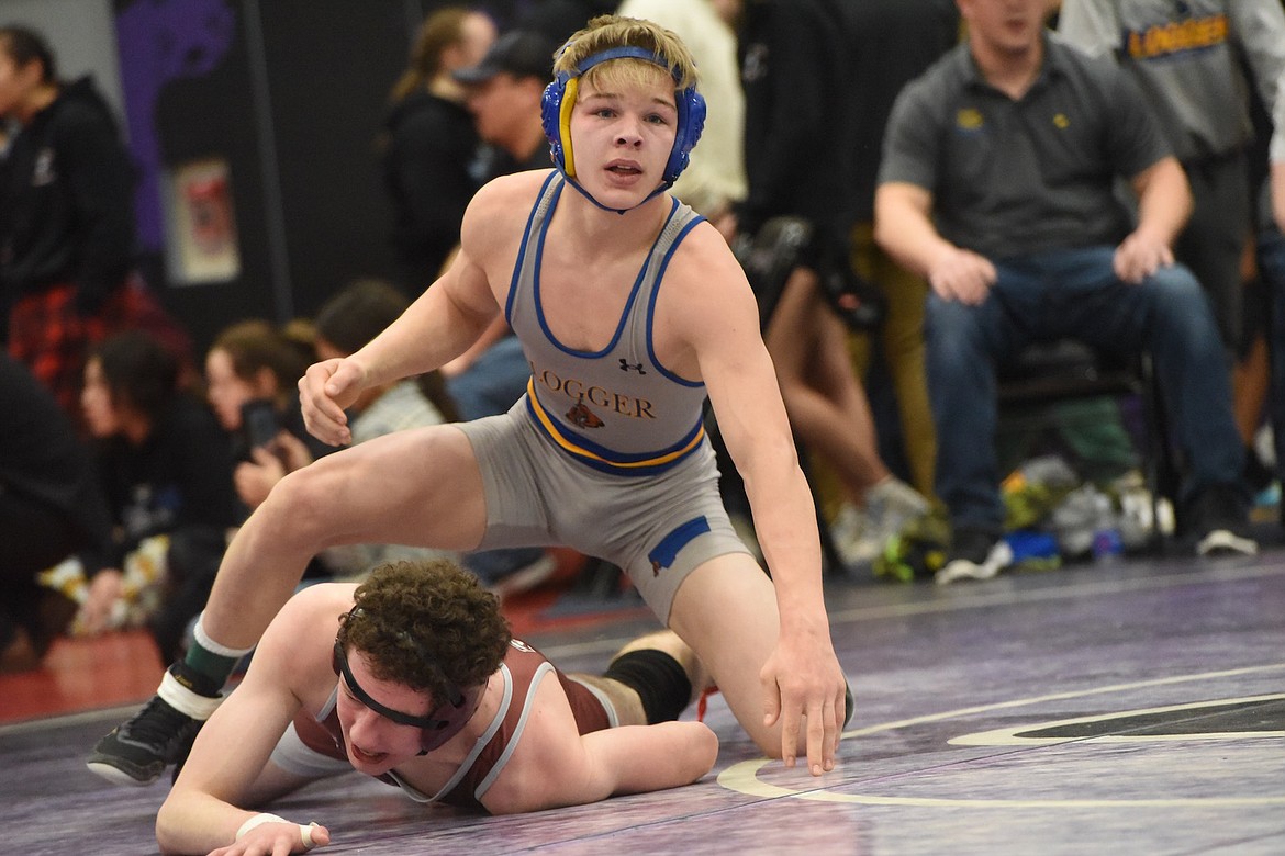Libby's Marley Erickson beat Butte Central's James Holmes and later placed fourth to qualify for state at 132 pounds at the Western Class A tournament in Polson. (Scott Shindledecker/The Western News)