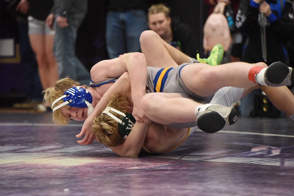 Libby's Cael Schwindt qualified for state with a eighth-place finish at 145 pounds at the Western Class A tournament in Polson. (Scott Shindledecker/The Western News)