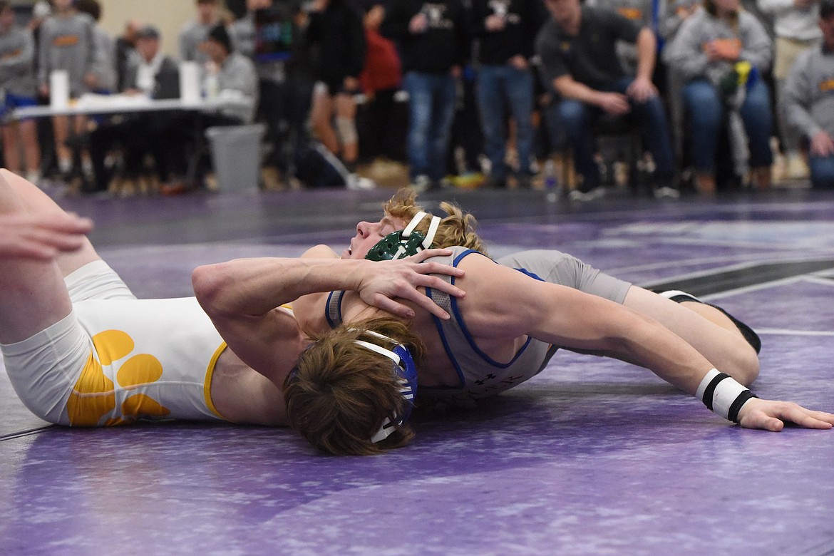 Libby's Connor Benson qualified for state with a sixth-place finish at 145 pounds at the Western Class A tournament in Polson. (Scott Shindledecker/The Western News)