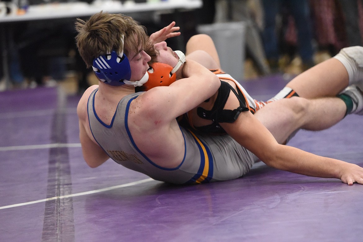 Libby's Xavier Reatz qualified for state with a eighth-place finish at 138 pounds at the Western Class A tournament in Polson. (Scott Shindledecker/The Western News)