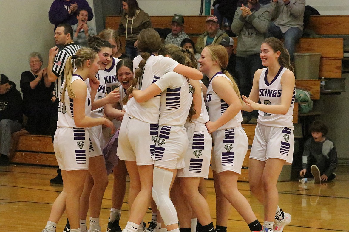 Lady Vikings celebrate two-point win over St. Regis Saturday. (Michelle Sharbono photo)