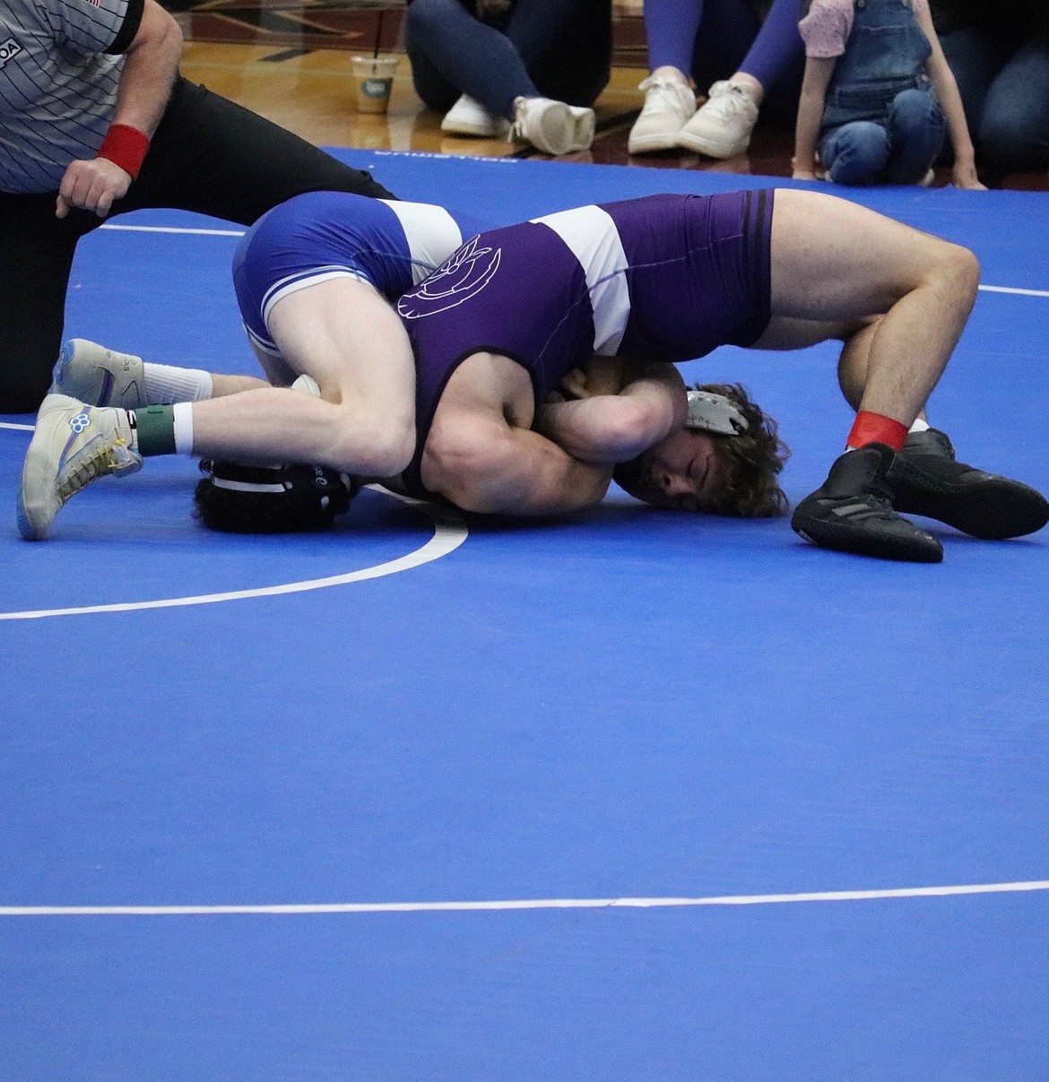 Thompson Falls 160-pounder Eli Ratliff is close to pinning his opponent in a match on his way to winning the 160 championship at this weekend's Western Division tournament in Pablo.  Ratliff earned a trip to the state finals in Billings this weekend with his championship in Pablo.  (Photo by Kami Milender)