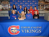 Signing photos Feb. 7, 2023